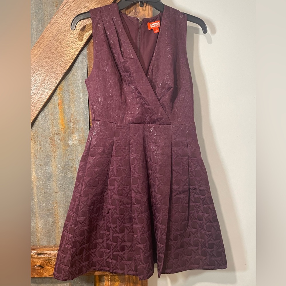This is so cute!  A burgundy knee length flare bottom.